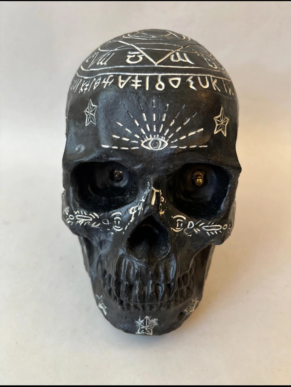 Black Skull Accent Sculpture with White Symbol Etching